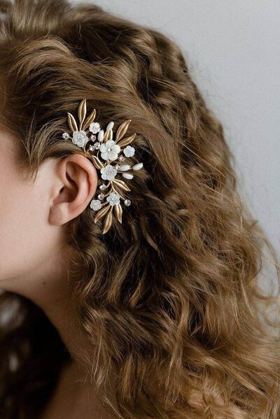 In 2022, floral hair pieces will be everywhere. In fact, it is one of the most popular styles that brides request from bridal hairstylists in New York.