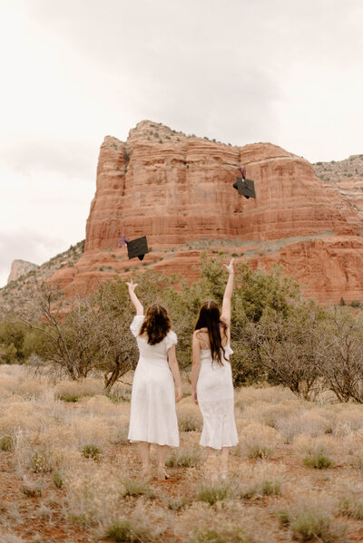 Best friend college grads throwing their caps in Sedona, Arizona