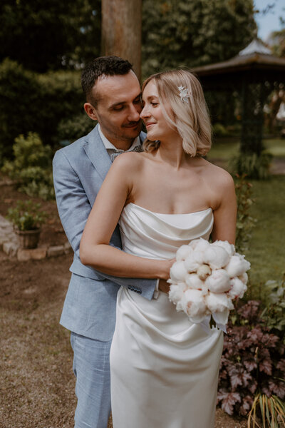 wedding couple standing close to each other