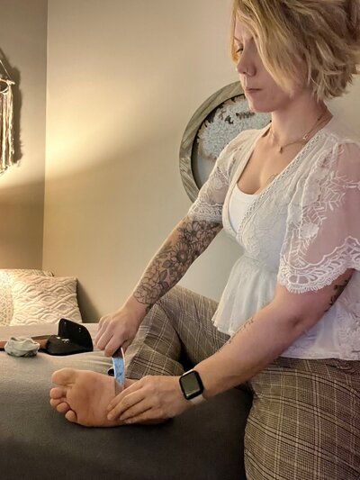 Owner Kayla Stroud-DuSavage performing massage therapy - Massage Therapy in Sun Prairie WI Specific Health Massage Therapy