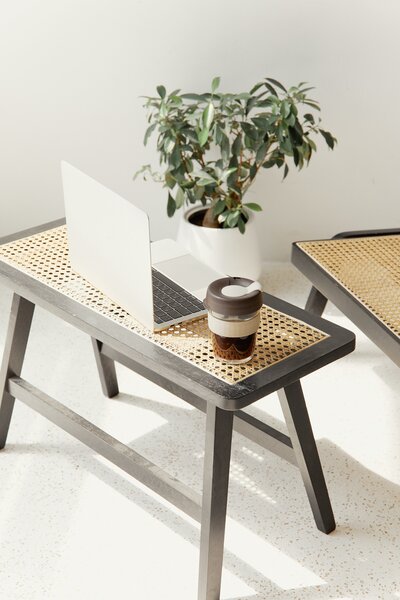 Home office with coffee and a laptop