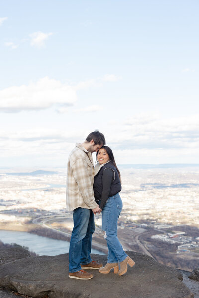 couple posing on a rock at Point Park near downtown Chattanooga