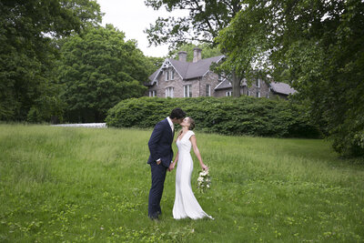 Bride and Groom Kiss at Garden Arboretum wedding in Philadelphia PA