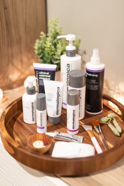 Dermalogica skin care line on a wooden tray at Rachel's Spa Services in Austintown, Ohio.