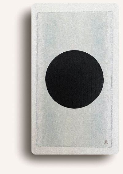 Minimalist tarot card featuring a bold black circle on a light background, representing the new moon.