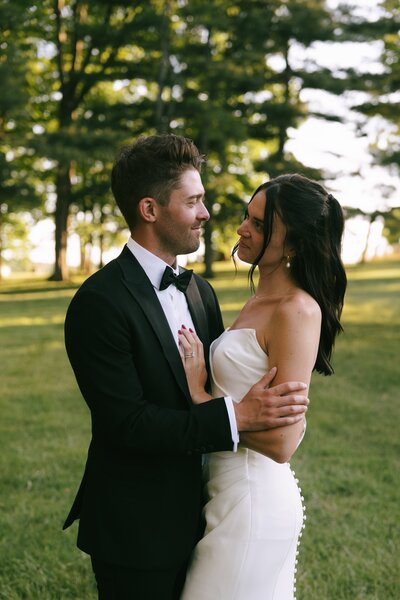 bride and groom kissing under veil