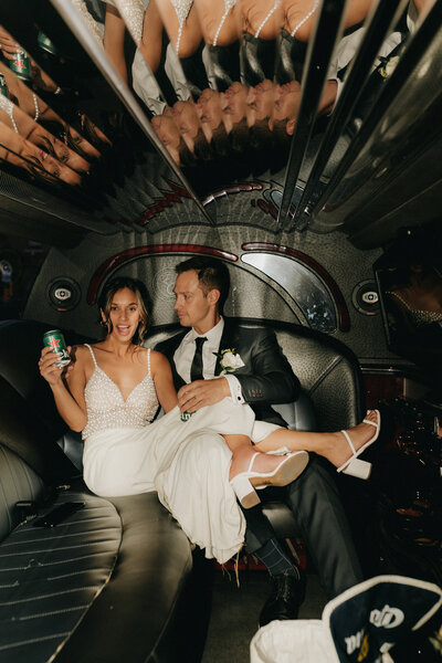 bride & groom in limo