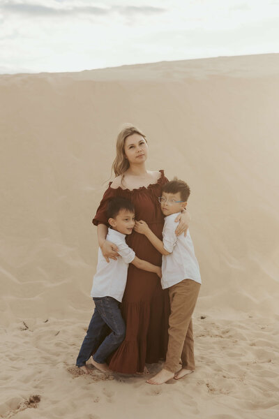 Sydney photographer - Story Lens Photography with her two boys at the sand dunes.
