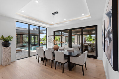 luxury dining room design from the Stillwater Modern Prairie project by Idaho luxury custom home builder Thompson Homes