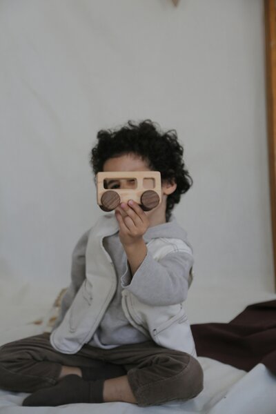 Petit Play Café indoor play space with toddlers exploring soft play equipment