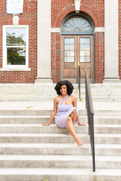 Woman sitting on the stairs