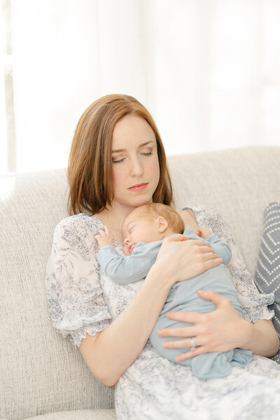 mom soaking baby in during Dumfries, Virginia newborn photography