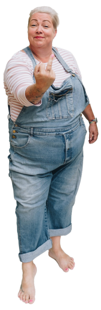 Pippa standing in a denim dungarees giving the middle finger