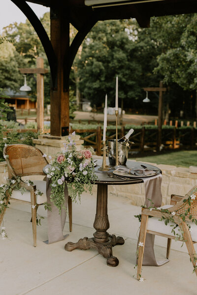 An outdoor Nashville sweetheart table by Frances and Jane Floral Design
