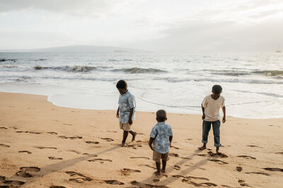 Henry brothers, Theo, Uriah, & Uzi playing on the beach.