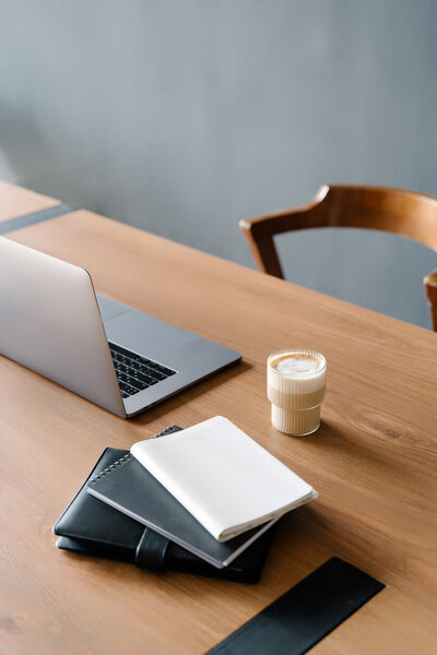 laptop and coffee on desk