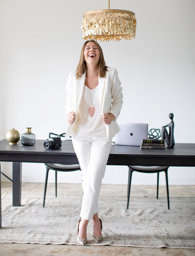 South Dakota wedding photographer laughing by table