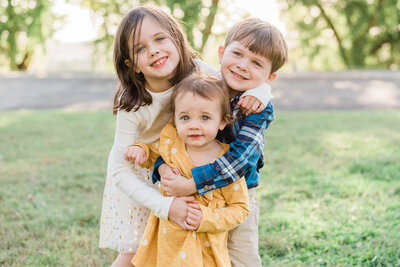 sibling portrait of three kids