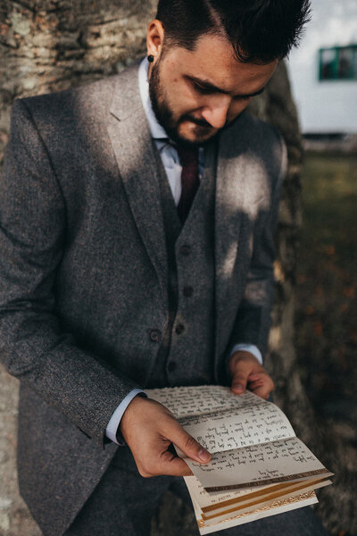 Groom gets emotional reading a letter from his bride before wedding ceremony