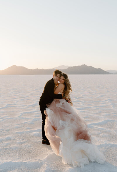 Salt Flats, Utah wedding photography of a young couple in a dreamy Vera Wang dress