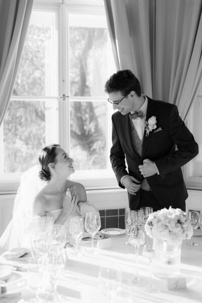 Luxury wedding in Europe – sophisticated bride in a modern wedding gown and groom in a timeless suit.