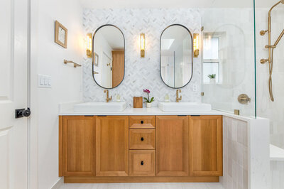 Modern fireplace surround with integrated cabinetry and natural materials.