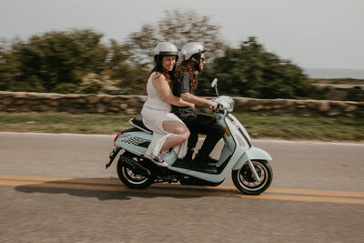 couple riding moped