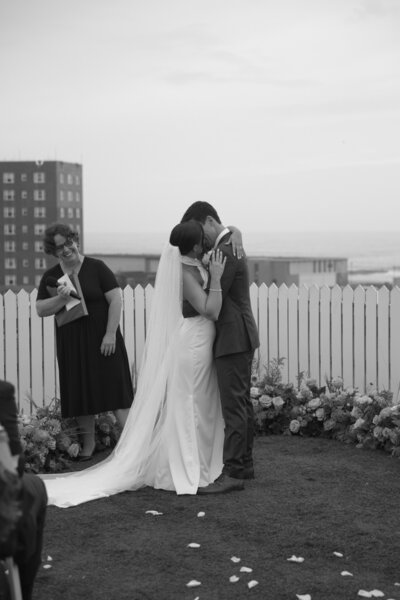Candid wedding ceremony photo from colorful fall wedding at The Asbury Hotel in New Jersey.