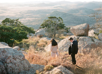 Bride and groom walk up memorial steps at their DC wedding