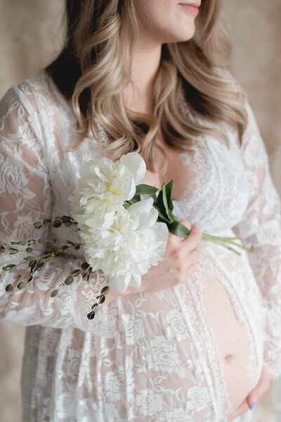Expectant mom in Ottawa walking in a beautiful pink dress