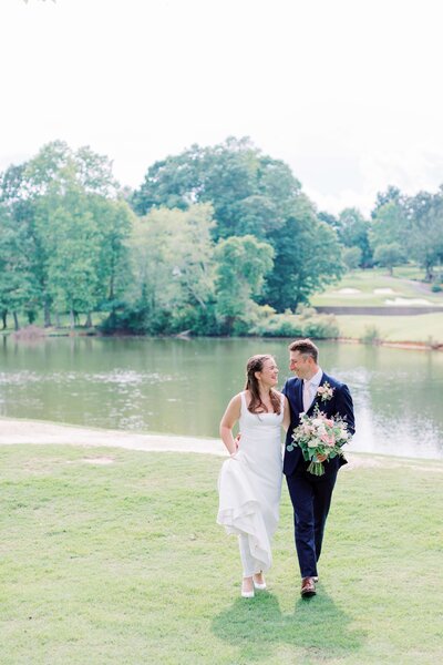 Bride and groom walk up memorial steps at their DC wedding
