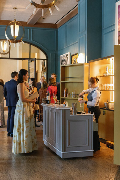 pink italian villa above covered wedding reception table