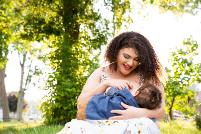 A mother nurses her infant son during a family photo session in Windsor, Ontario.
