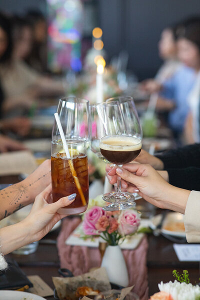 Friends toasting at baby shower at AOC Brentwood