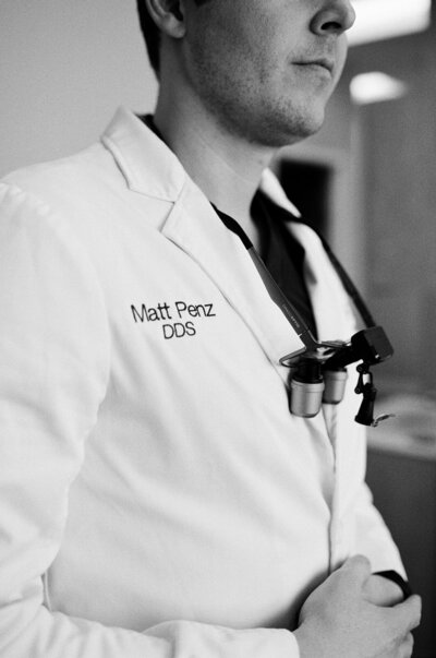 senior photography in front of modern industrial clean windows minneapolis minnesota