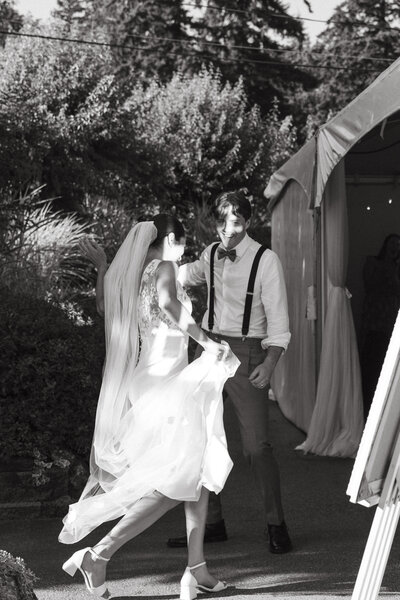 fun photos of bride and groom piggy back ride
