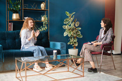 Two women communicate at The Practice, which offers compassionate therapy for women in Arizona.