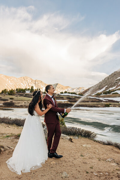 Boulder Wedding Photographer captures couple kissing during winter elopement