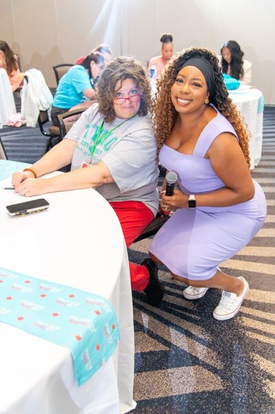 Deonna and a woman at a table