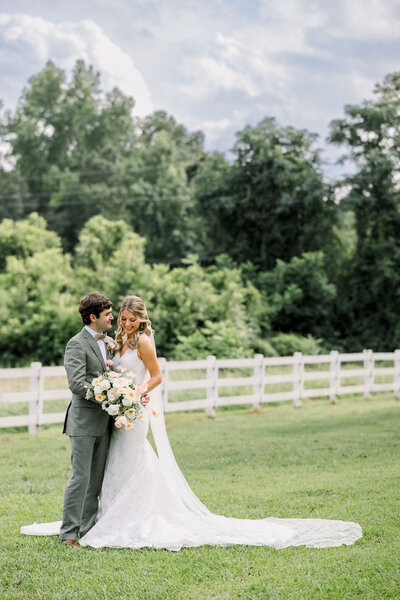 Bride and Groom at their wedding reception after a ceremony at Cathedral Christ The King in Atlanta