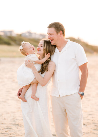 Boys playing in the water during families nantucket family photo session