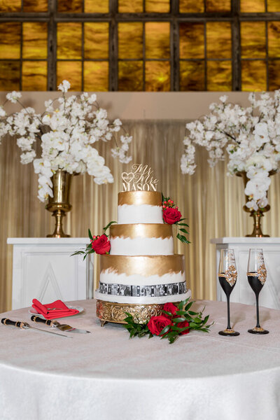 Luxury white and gold Wedding cake at southern exchange ballrooms, photo taken by Bonnie Blu Studios