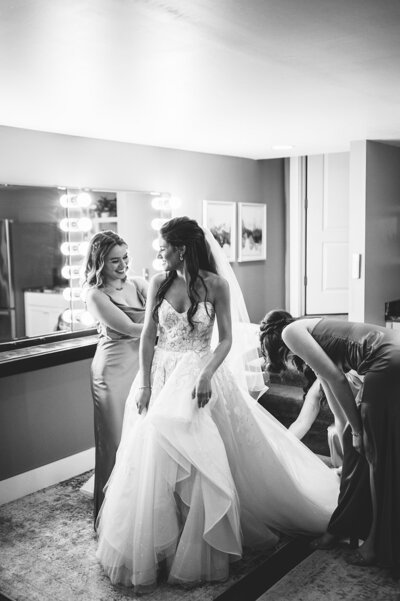 black and white photo of a bride getting ready at Willowbrook