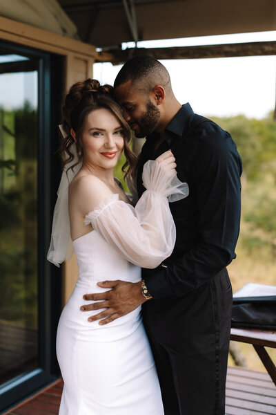 Elopement couple kissing while on a safari retreats