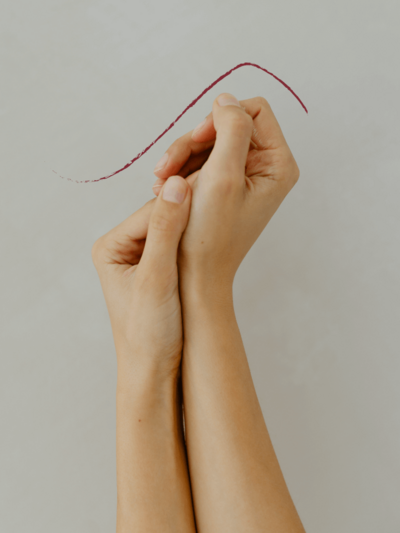 Two hands intertwined professionally photographed in Chicago.