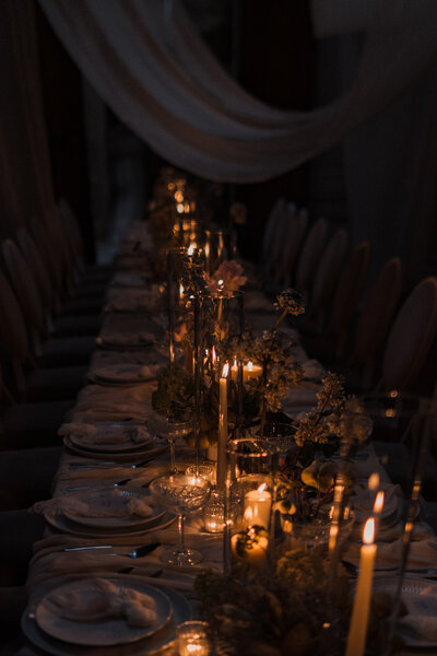 Wedding photographer captures couple taking a stroll hand in hand at their french chateau wedding.