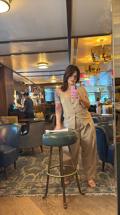 Susan taking a mirror selfie during a color analysis event in Washington, DC