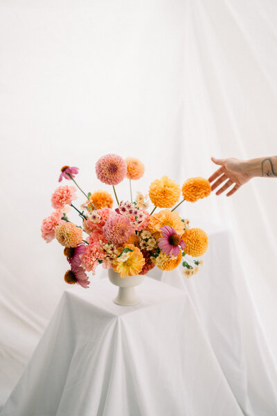 Luxury wedding flowers in ceramic vase styled organic and artful in Phoenix Arizona