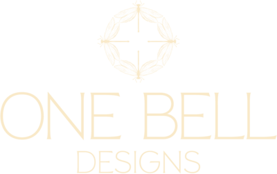 Logo that says One Bell Designs with 4 dragonflies in a circle