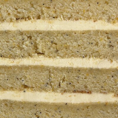 Close up of the cake and filling in our passion poppyseed cake